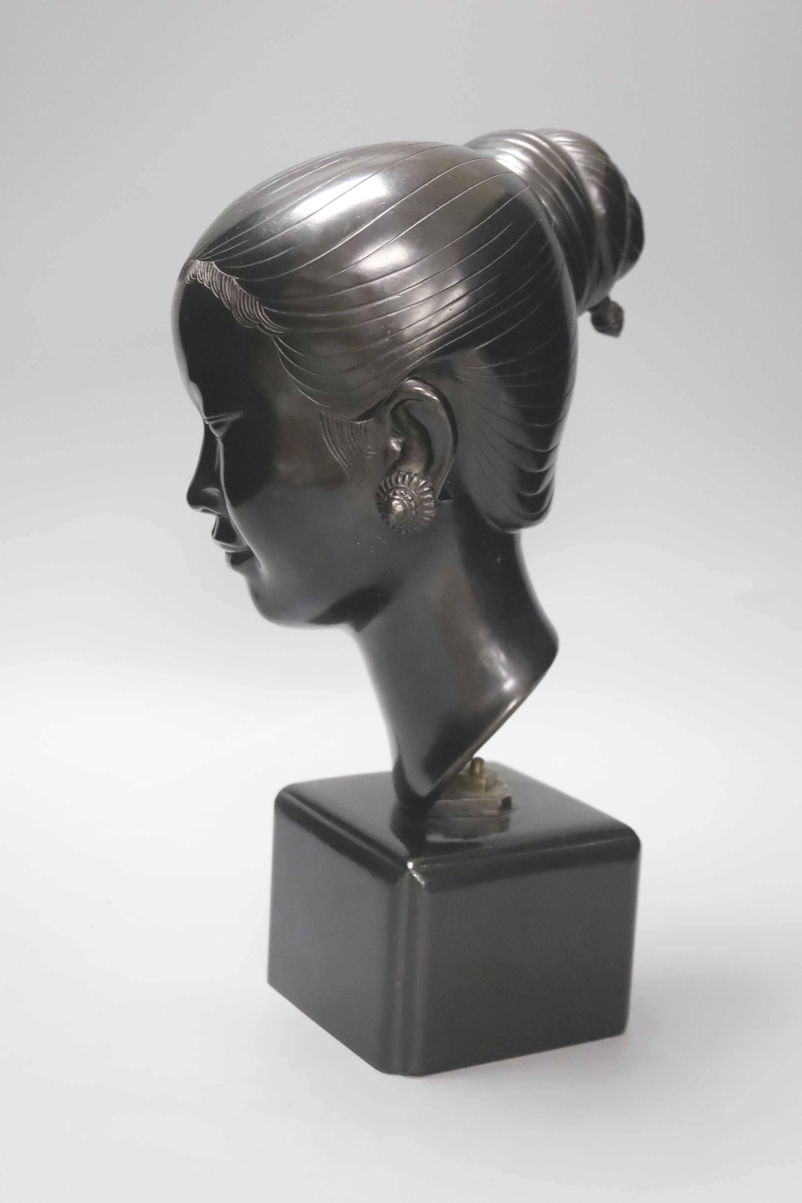 A Sino-Japanese 20th century bronze bust of a Geisha, H 22cm